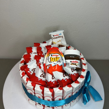 BS1-040 Nutella & Kinder Joy in a Gift, with a blue ribbon, height 11cm, diameter 19cm