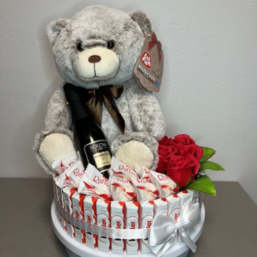 BS1-012 Elegant Teddy Bear with Raffaello, Kinder and Soapy Roses. Diameter: 26 cm, Height: 42 cm.
