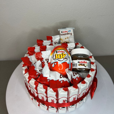 bs1-050-chocolate-adventure-with-kinder-bueno-country-nutella-with-red-ribbon-height-11cm-diameter-19cm